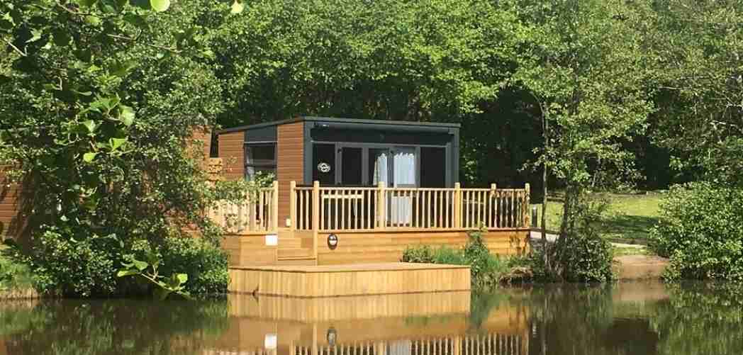 best UK carp fishing holidays lodge on a lake